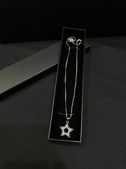 Zyro celestial star pendant featuring a delicate star-shaped charm with intricate details on a fine chain.