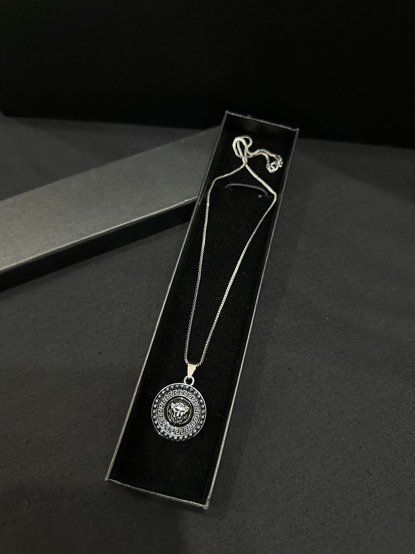 Zyro Imperial Lion Medallion Pendant featuring a detailed lion head design on a silver-toned chain.