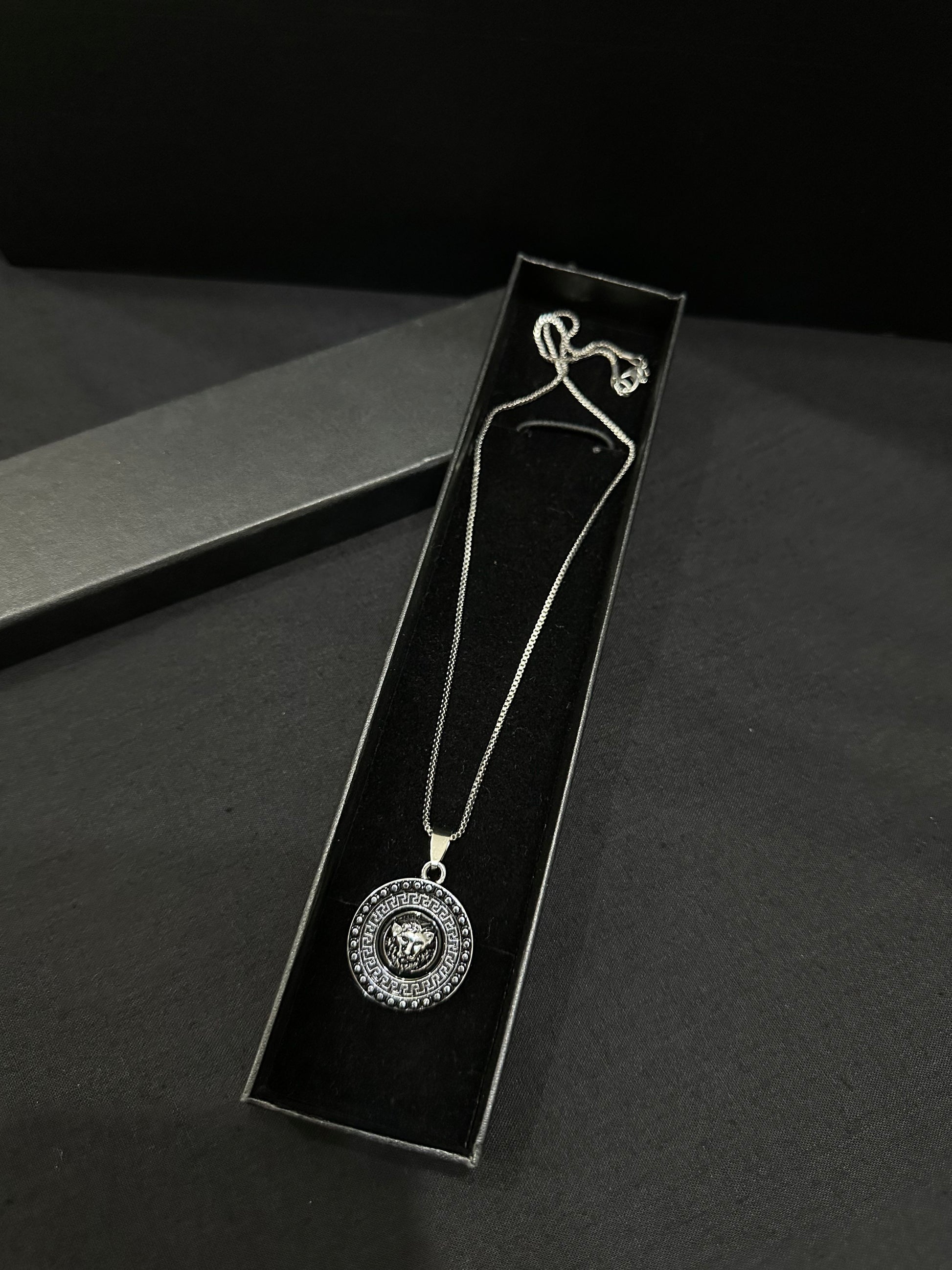 Zyro Imperial Lion Medallion Pendant featuring a detailed lion head design on a silver-toned chain.